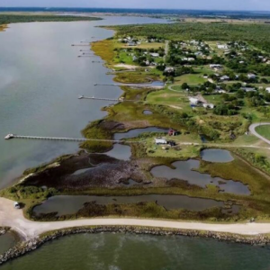 FANTASTIC INVESTMENT OPPORTUNITY! LOVELY TEXAS LOT JUST MOMENTS FROM THE BEACH! Only $99/month!